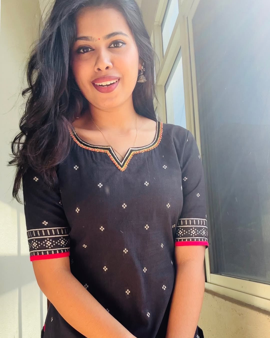 Shringar black kurti with leaf neck and handembroidery