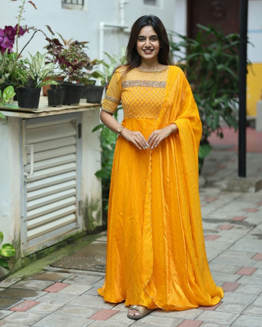 Sakshi - Mustard yellow floor length gown and duppata | Petals Chennai - Petals Chennai